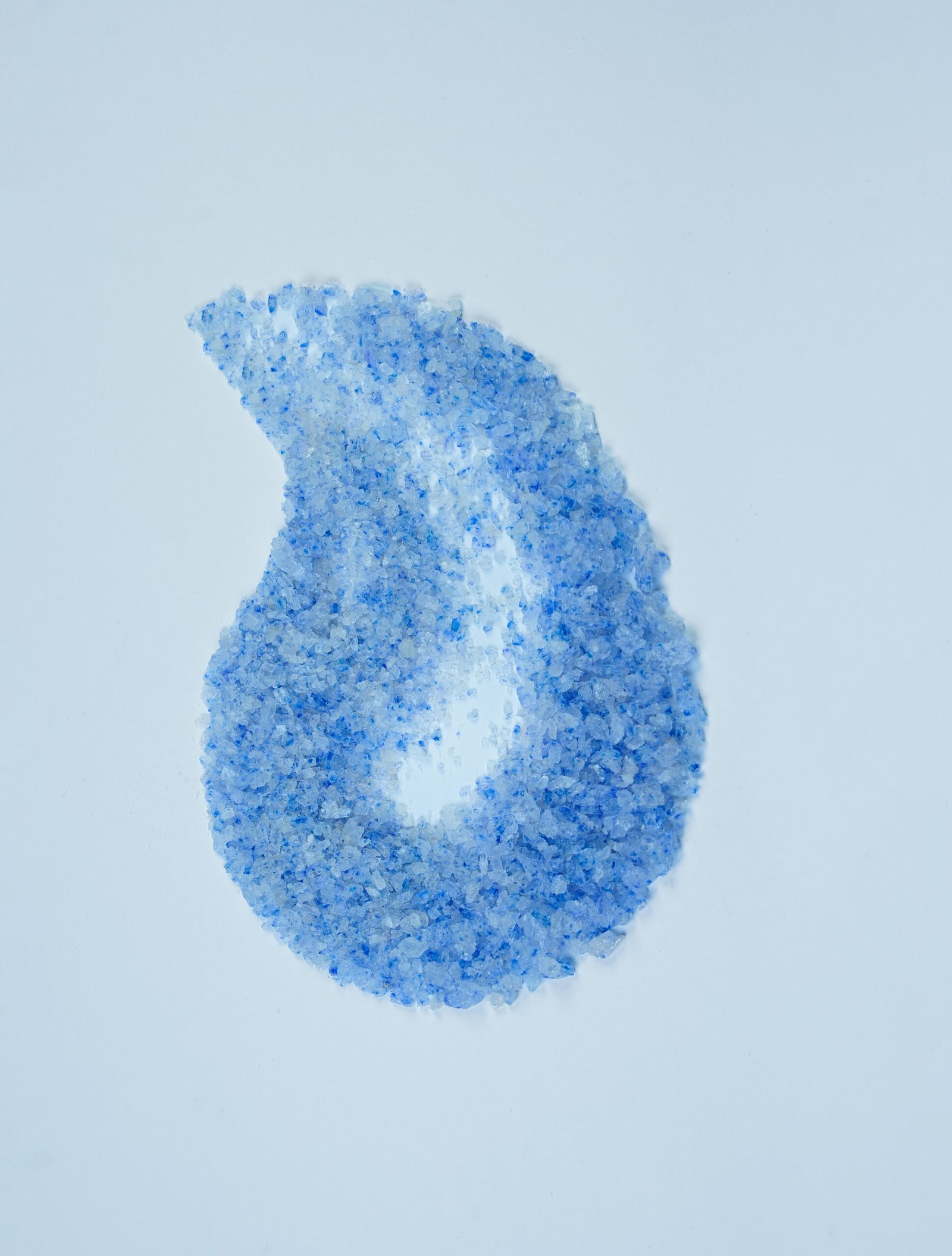 A rare natural crystal salt formed under unique geological pressure, distinguished by its deep blue hue and rich mineral composition.